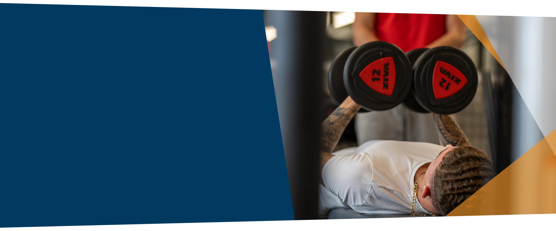 man lifting dumbells